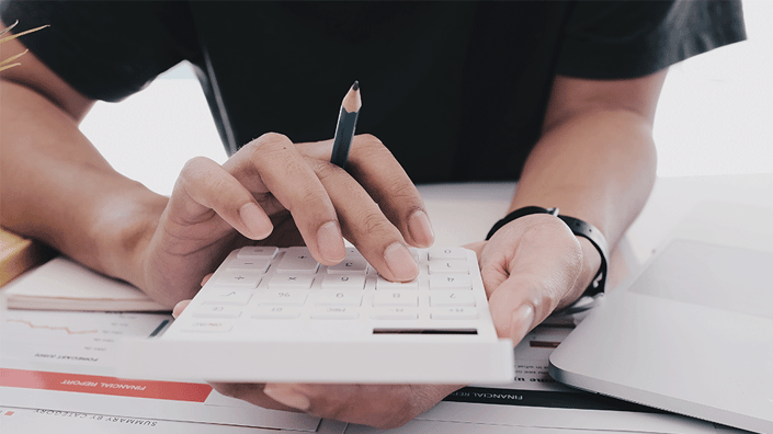 Woman-Using-Calculator